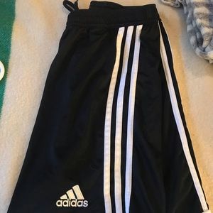 Black Adidas shorts.
